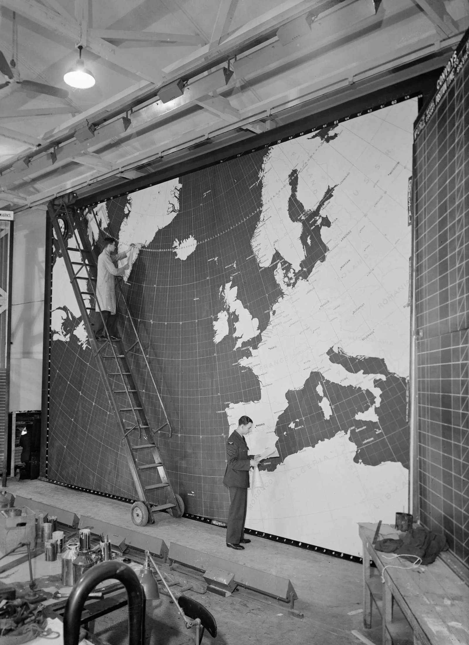 An operations map at RAF Coastal Command Headquarters at Northwood in Hertfordshire, 9 July 1943.
Ten million square miles of sea. The vast extent of Coastal Command's theatre of operations is graphically displayed on this newly commissione