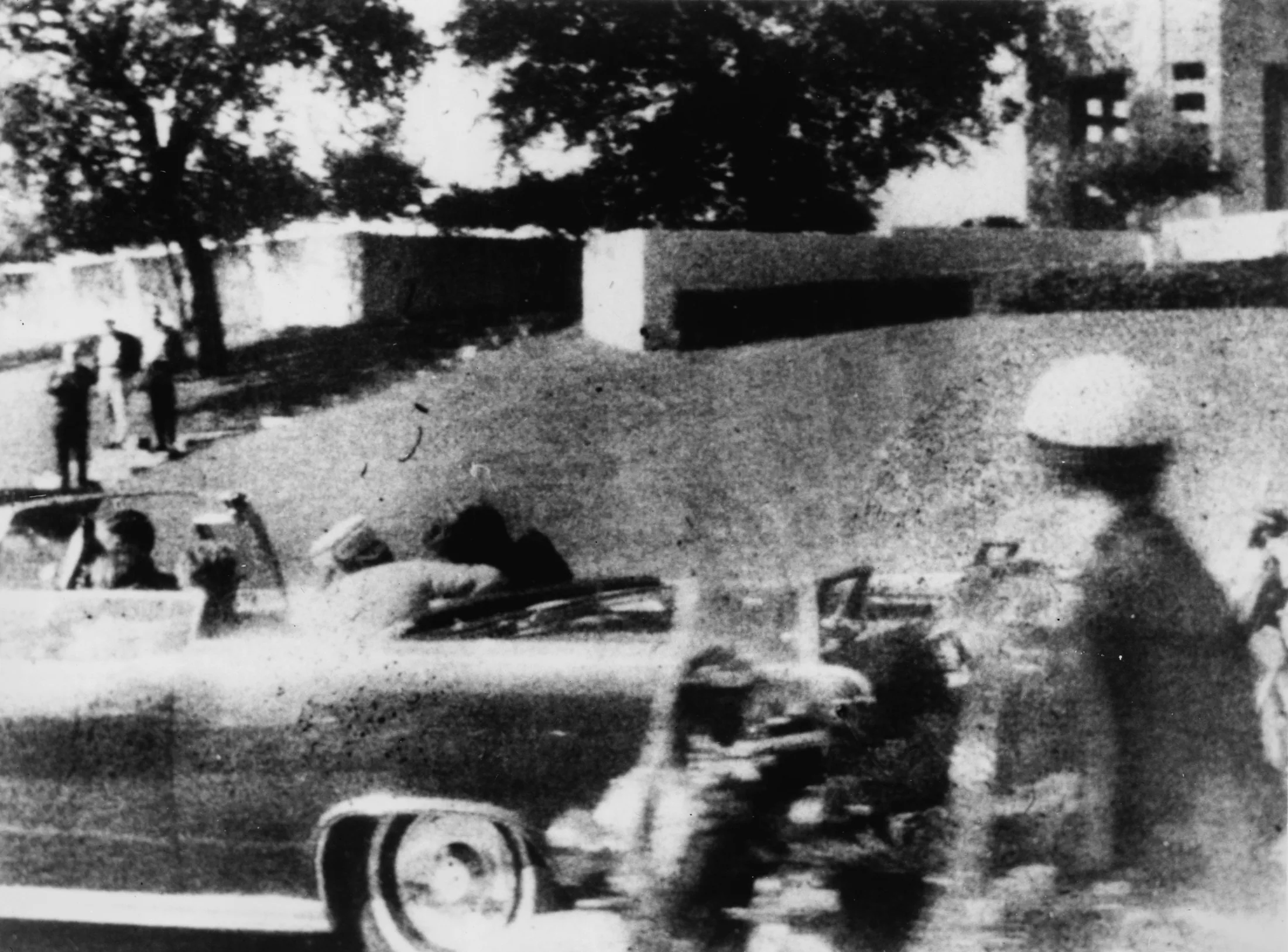 Polaroid photograph of the assassination of President John F. Kennedy, taken an estimated one-sixth of a second after the fatal head shot. (Friday, November 22, 1963, Elm Street, Dealey Plaza, Dallas, Texas)