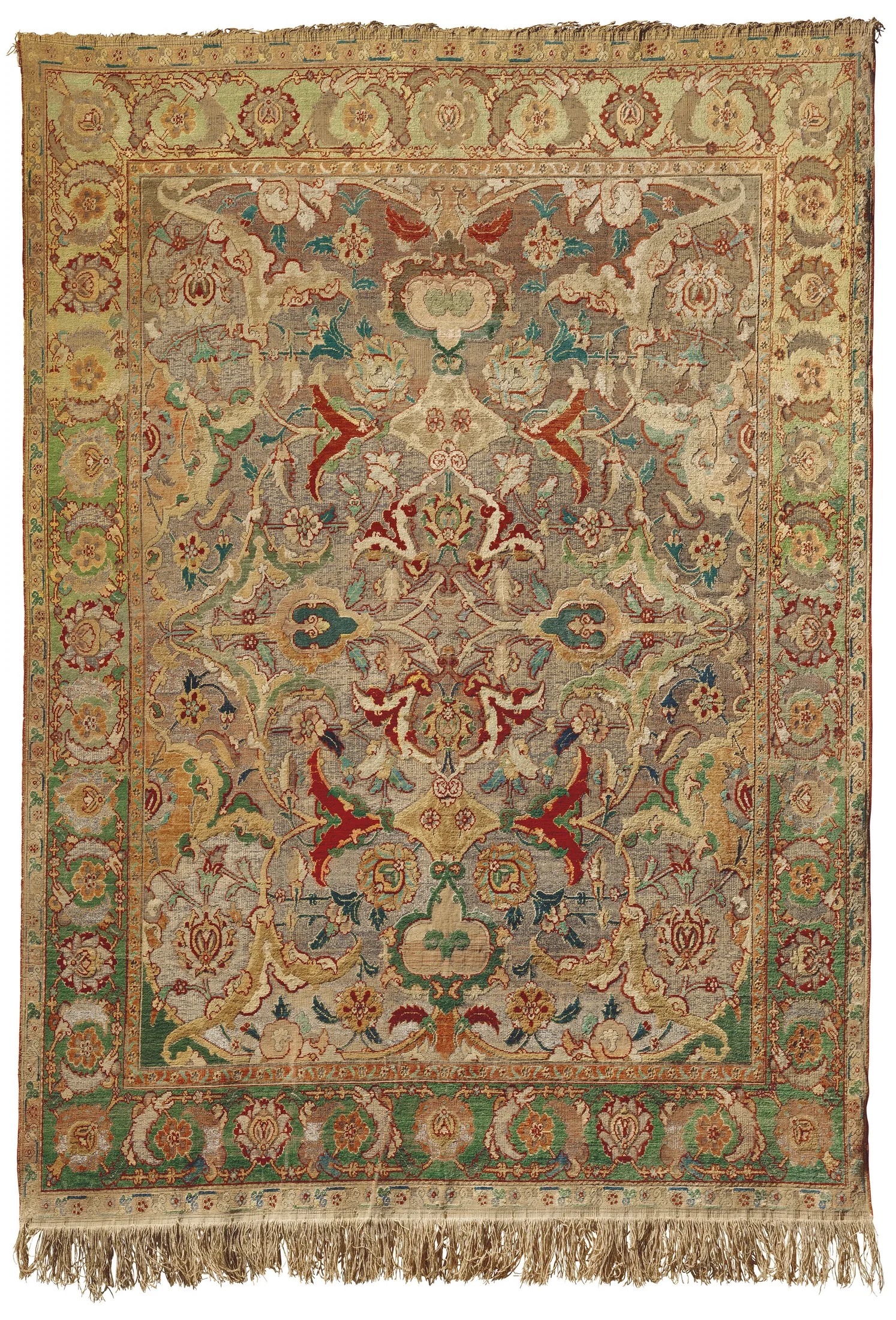 A HIGHLY IMPORTANT SAFAVID SILK AND METAL-THREAD 'POLONAISE' CARPET
PROBABLY ISFAHAN, CENTRAL PERSIA, EARLY 17TH CENTURY
The field centred by a quatrefoil medallion formed of inverted palmettes linked by delicate flowering stems that extend