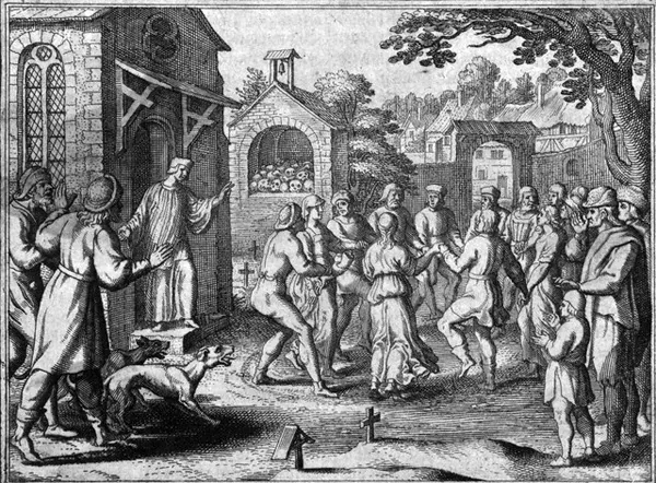 Citizens of 1518 Strasbourg with the psychogenic disorder choreomania or 'dancing plague' dancing amid graves in a churchyard.