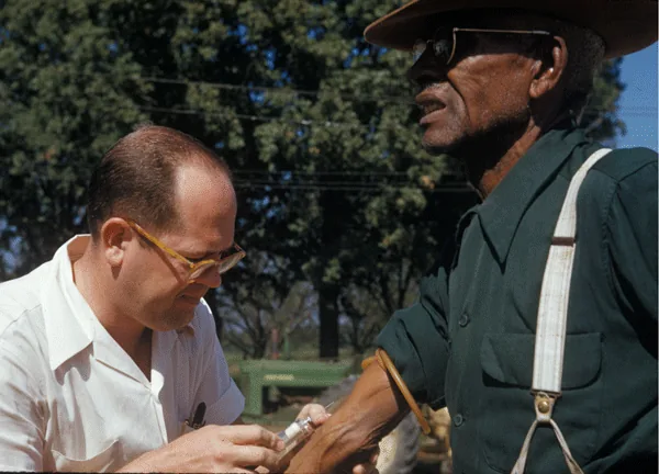 Doctor injects test subject with placebo as part of the Tuskegee Syphilis Study