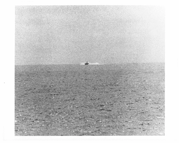Photograph of North Vietnamese Torpedo Boat Approaching the U.S.S. Maddox During the Gulf of Tonkin Incident - NARA - 594298
