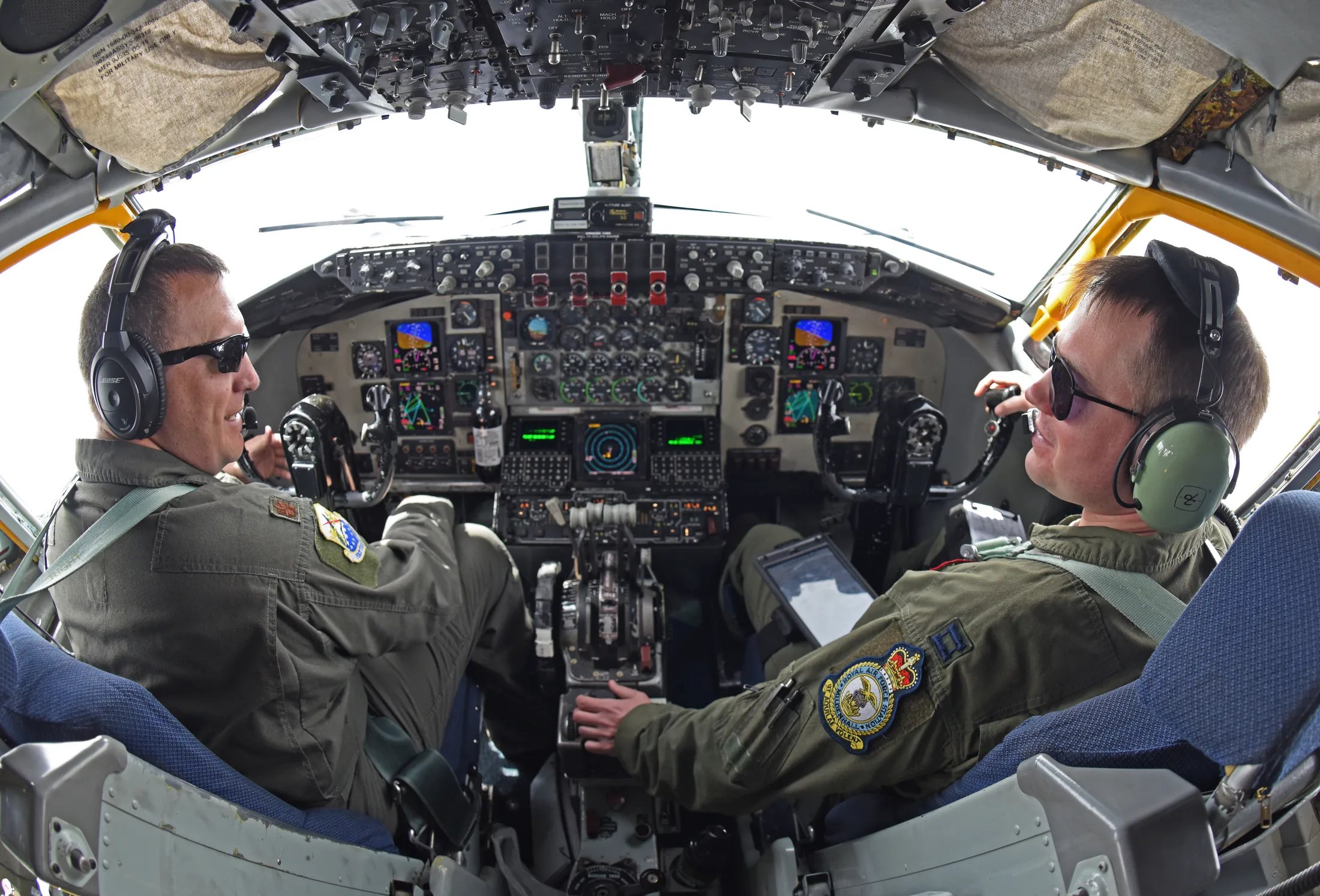 U.S. Air Force Maj. Jared Alden, 100th Air Refueling Wing Command Post chief of C2 operations, and U.S. Air Force Capt. Grant Starkweather, 351st Air Refueling Squadron pilot, discuss flight operations during the “FURIOUS 48” readiness exer