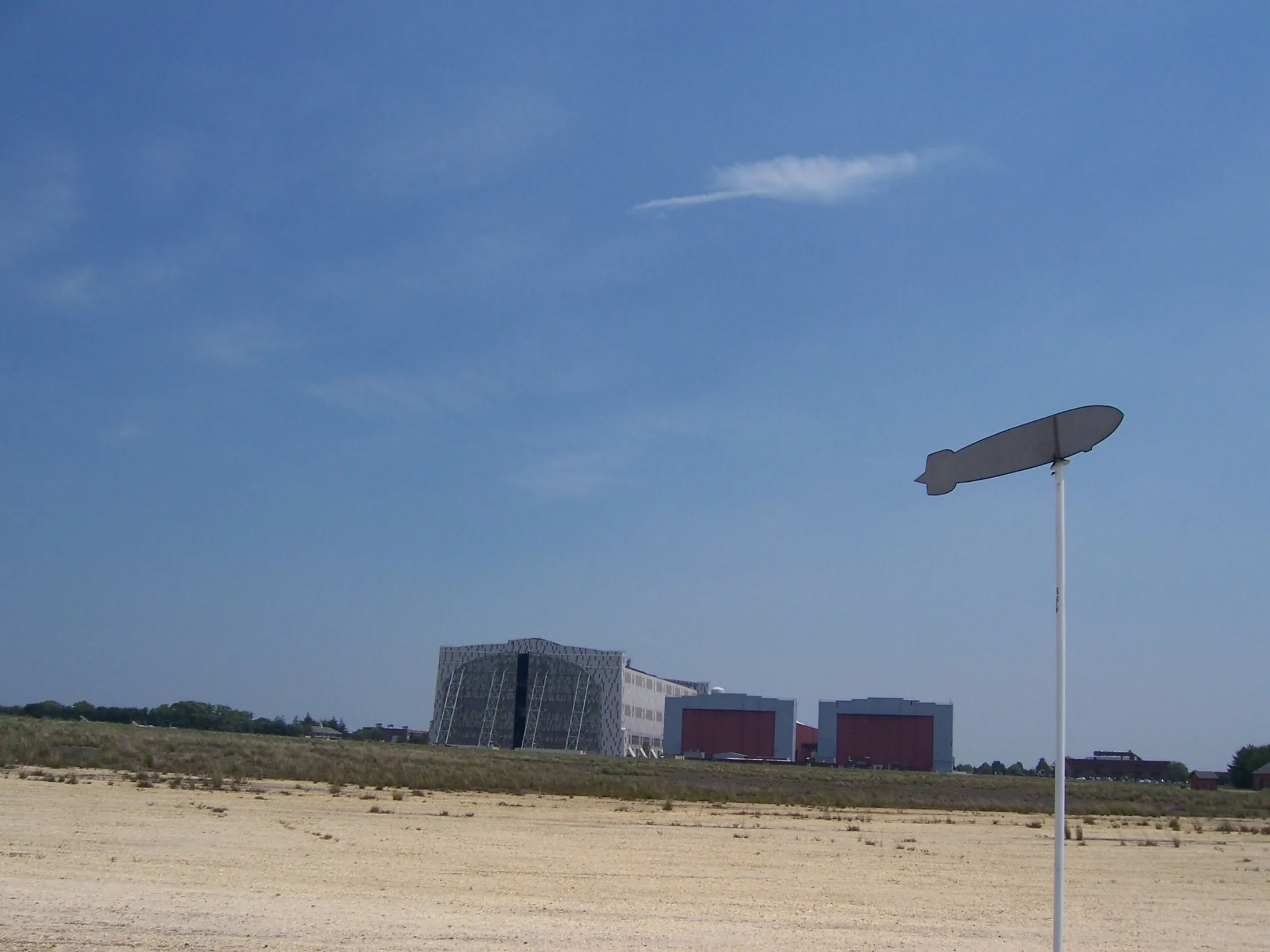Marker commemorating the Hindenburg disaster of May 6, 1937, in Lakehurst, New Jersey. Hangar No. 1 is in the background.