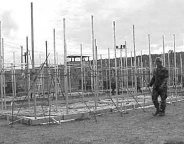 Photo by Navy Chief Petty Officer Gabe Puello
Camp X-Ray, under construction prior to arrival of first detainees, Jan 11. Guantanamo Bay, Cuba,.