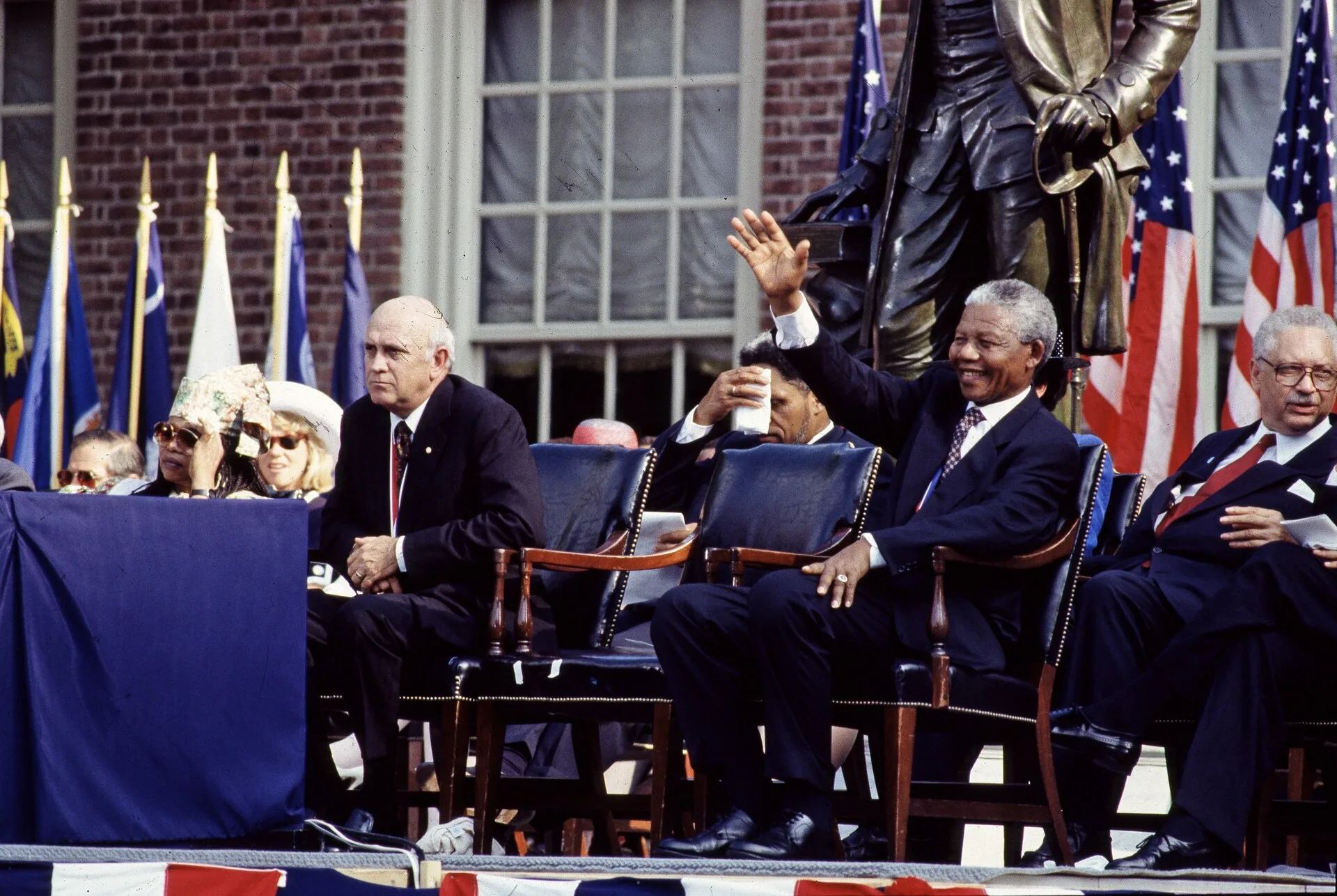 Title: F.W. de Klerk, left, the last president of apartheid-era South Africa, and Nelson Mandela, his successor, wait to speak in Philadelphia, Pennsylvania
Physical description: 1 transparency : color ; 4 x 5 in. or smaller.
Notes: Digita