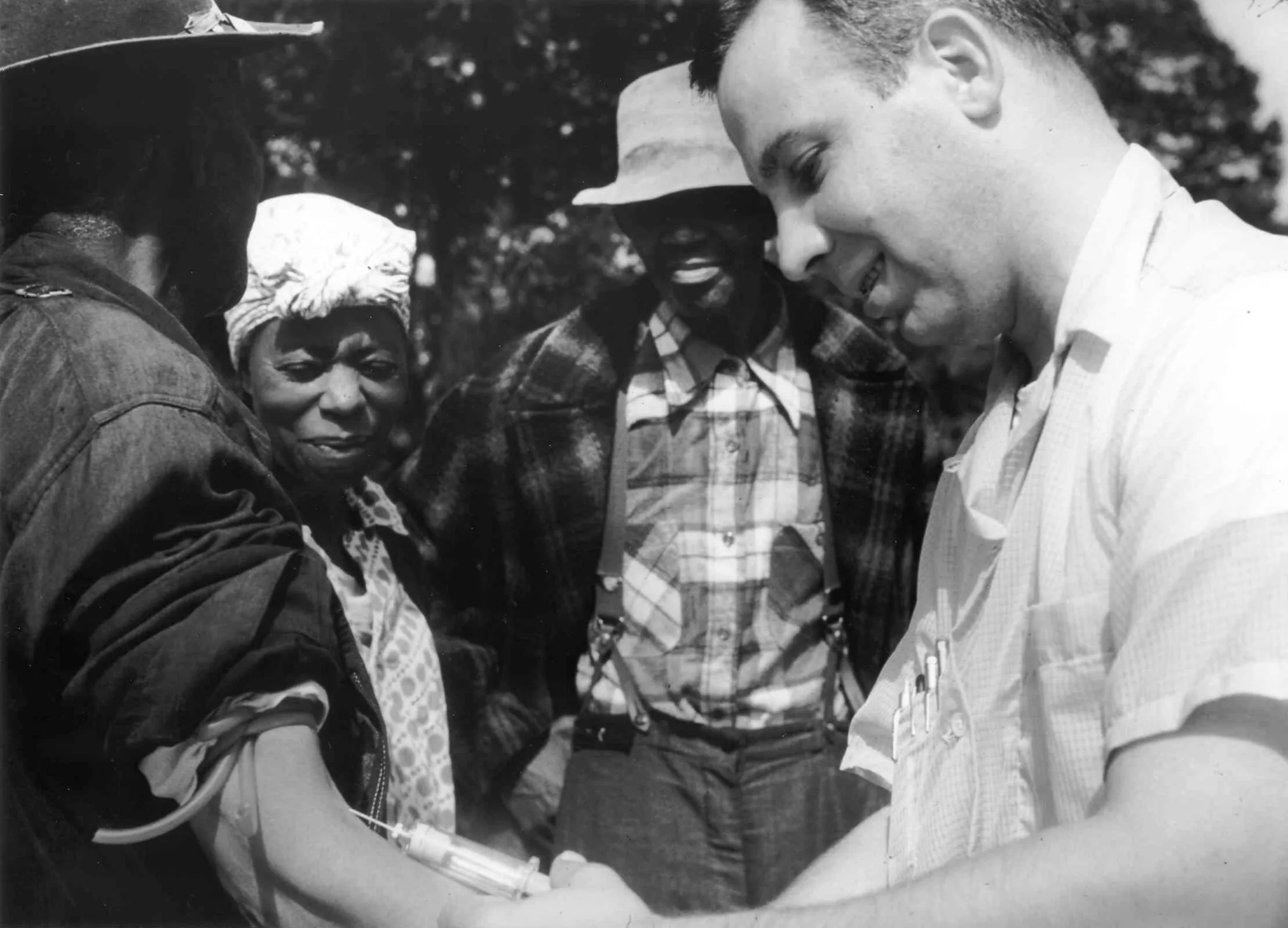 Doctor drawing blood from a patient as part of the Tuskegee Syphilis Study