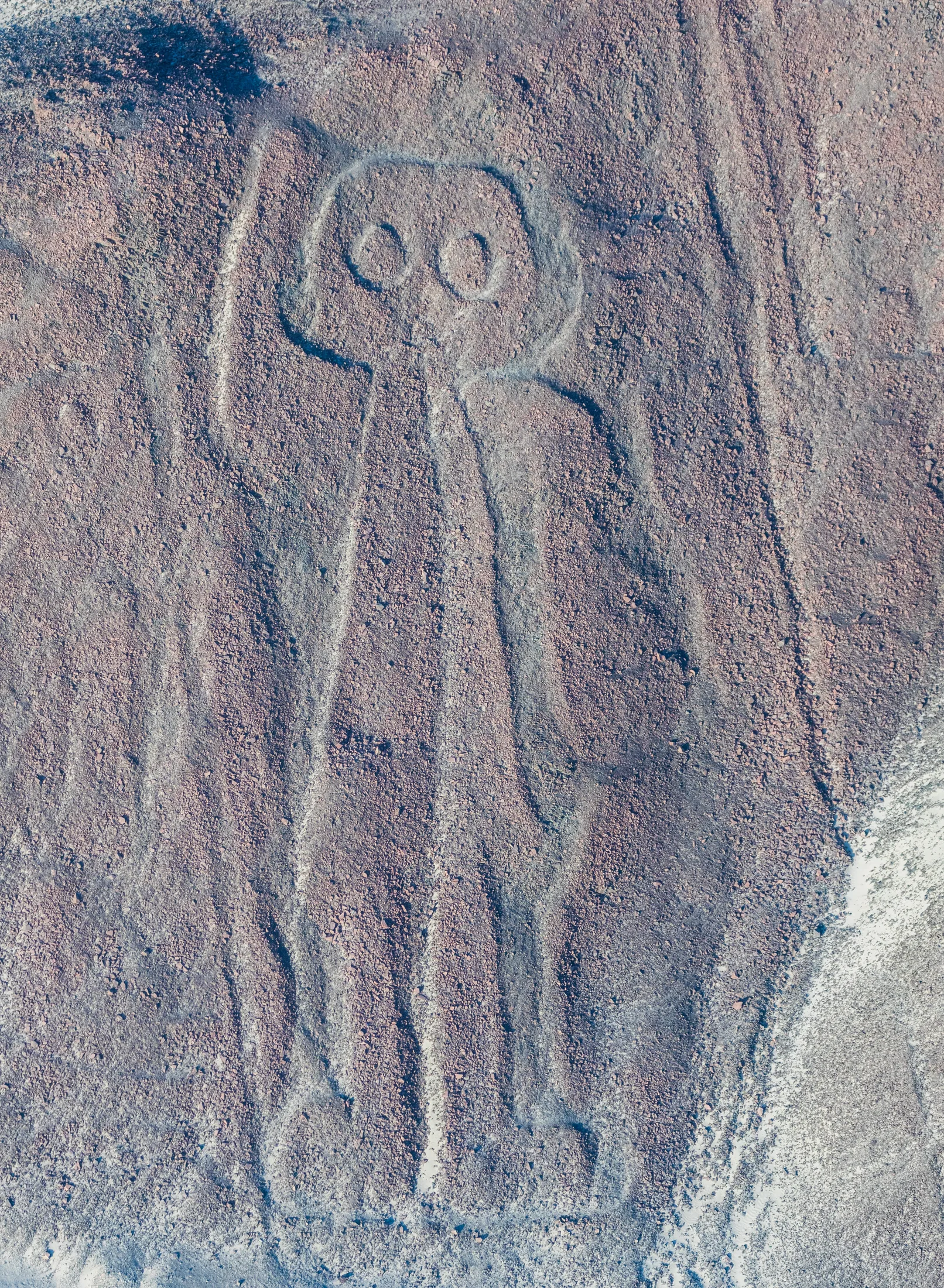 Aerial view of the "Owlman" aka "Astronaut", the most enigmatic geoglyph of the Nazca Lines, which are located in the Nazca Desert in southern Peru. The geoglyphs of this UNESCO World Heritage Site (since 1994) are spread over a 80 km (50 m