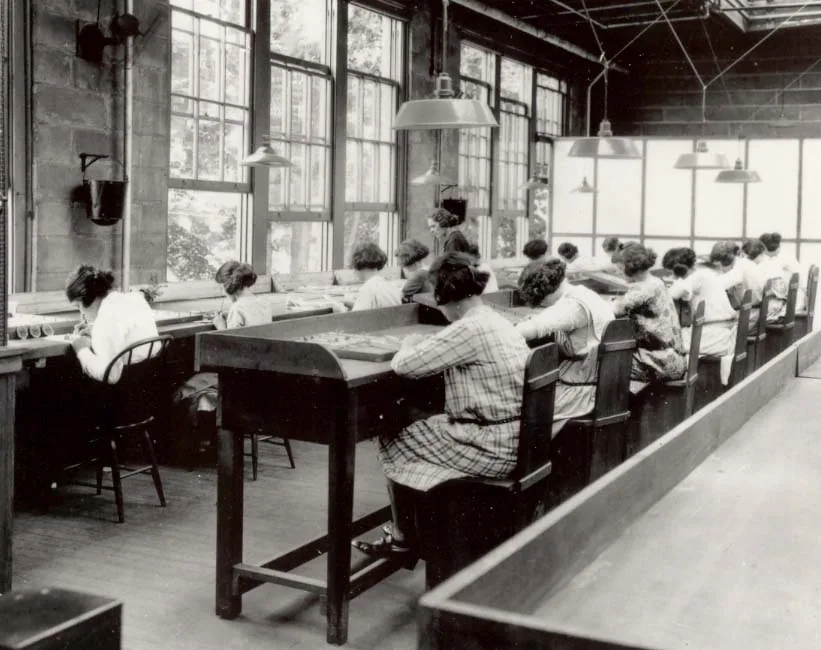 Radium Girls work in a factory of the United States Radium Corporation.