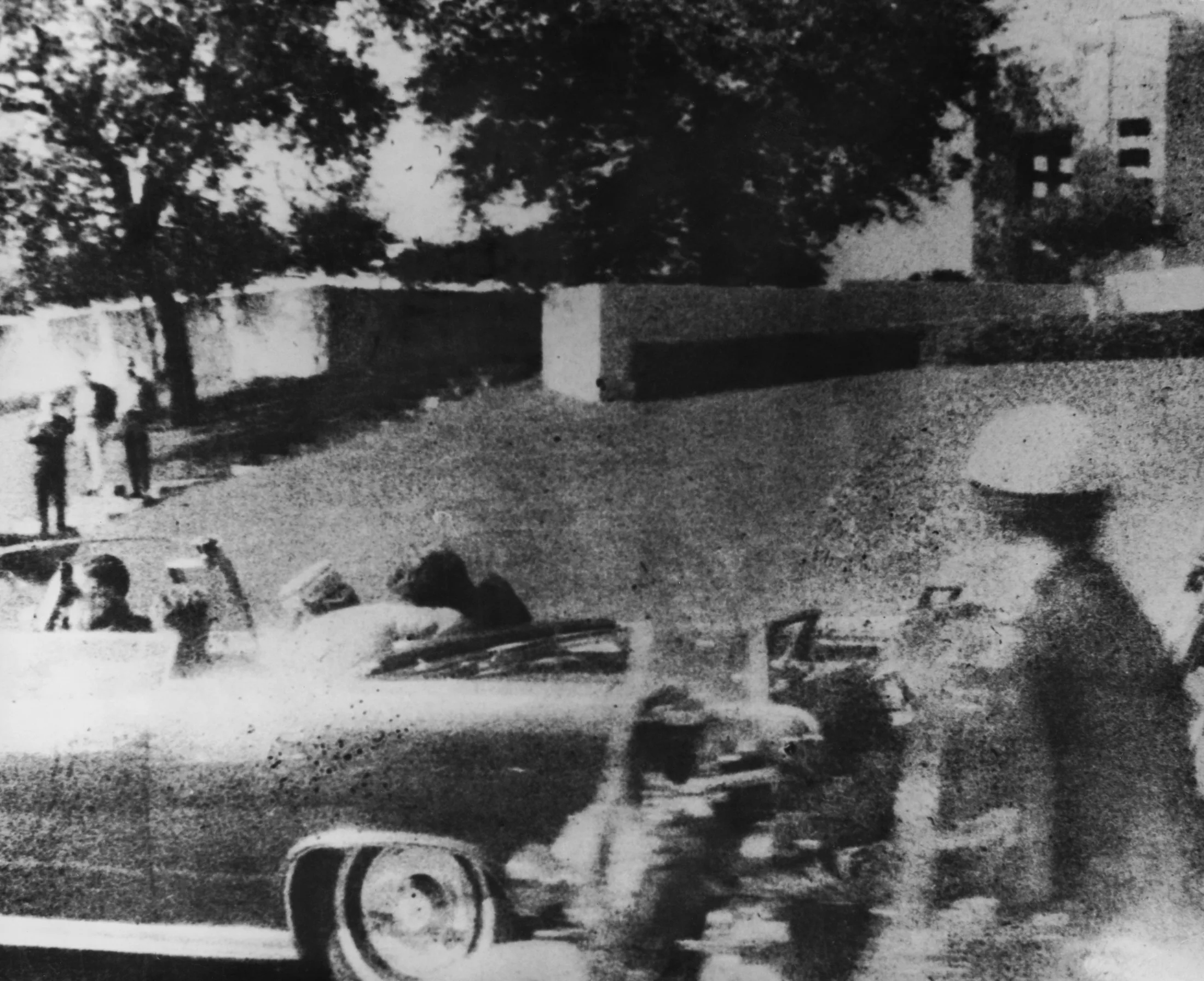 Polaroid photograph of the assassination of President John F. Kennedy, taken an estimated one-sixth of a second after the fatal head shot. (Friday, November 22, 1963, Elm Street, Dealey Plaza, Dallas, Texas)